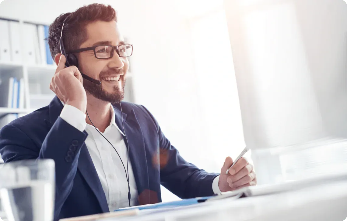 A trader using Smartphone to contact HGM GLOBAL